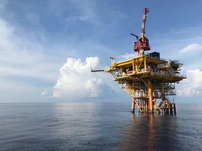Offshore oil rig on calm sea